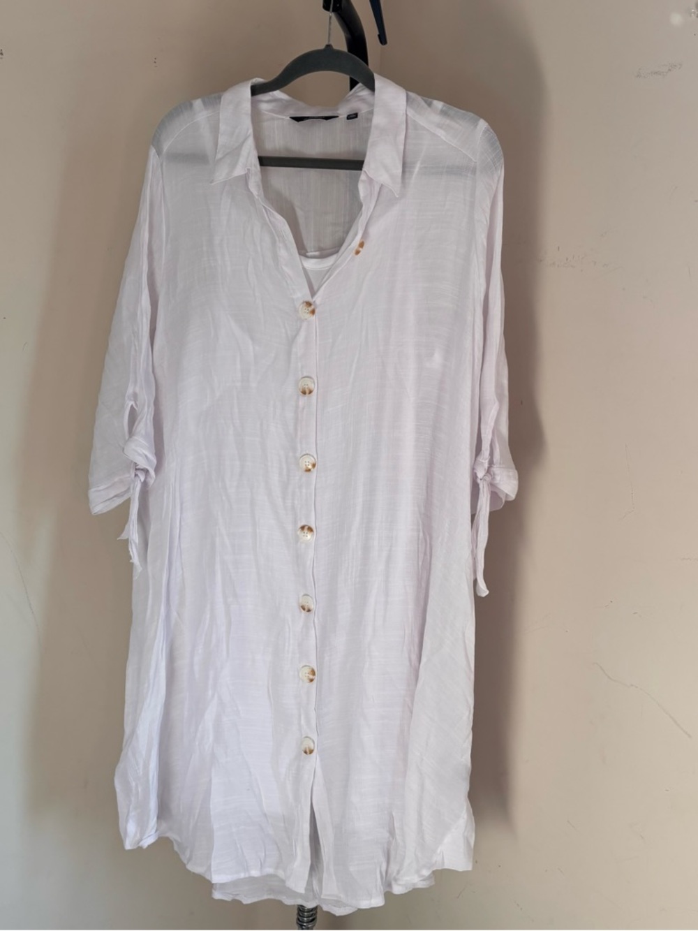 Mlle Gabrielle white linen shirt dress with tie detail at cuffs.